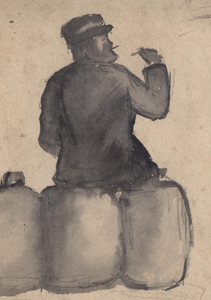 Мужчина, сидящий на мешках.