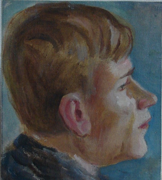 Голова  молодого человека в профиль.