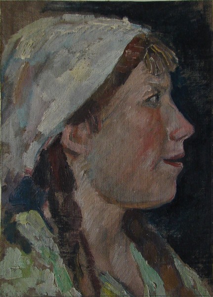 Голова девушки в профиль.