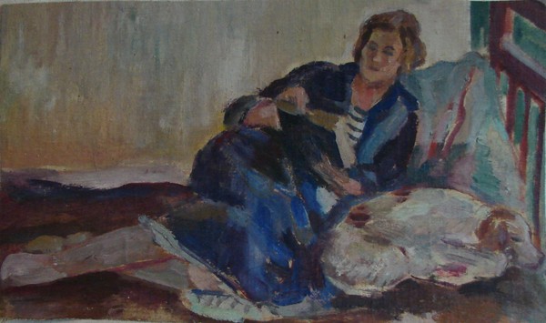 Женщина, лежащая с книгой.