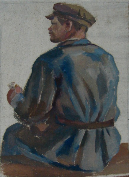 Фигура сидящего мужчины.